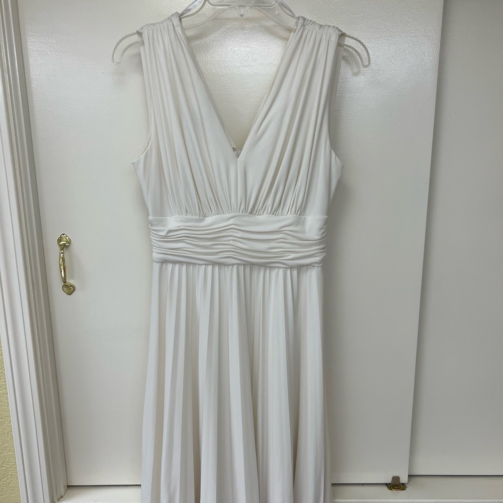 Cream-color zip back cocktail dress. Size 6.